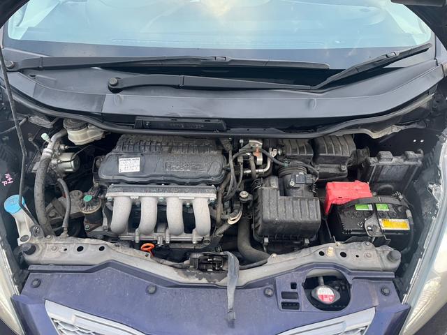 フィット Ｇ　スマートスタイルエディション　★車検令和８年９月★ナビ★テレビ★バックカメラ★ＥＴＣ★社外１４インチアルミホイール★スマートキー★エンジン型式Ｌ１３Ａ★カラーコードＰＢ８３Ｐプレミアムディープバイオレットパール★（22枚目）