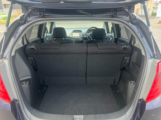 フィット Ｇ　スマートスタイルエディション　★車検令和８年９月★ナビ★テレビ★バックカメラ★ＥＴＣ★社外１４インチアルミホイール★スマートキー★エンジン型式Ｌ１３Ａ★カラーコードＰＢ８３Ｐプレミアムディープバイオレットパール★（24枚目）