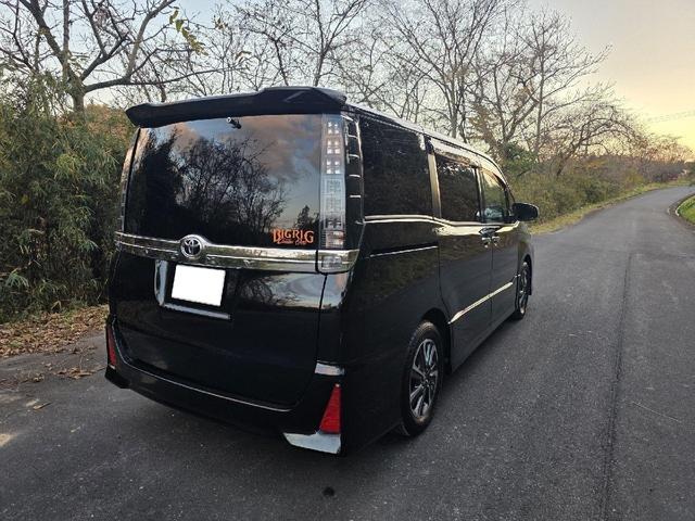 ヴォクシー ZS 煌 ETC TV レーンアシスト 衝突被害軽減システム 両側電動スライドドア オートマチックハイビーム LEDヘッドランプ スマートキー アイドリングストップ 後席モニター 3列シート CVT(16枚目)