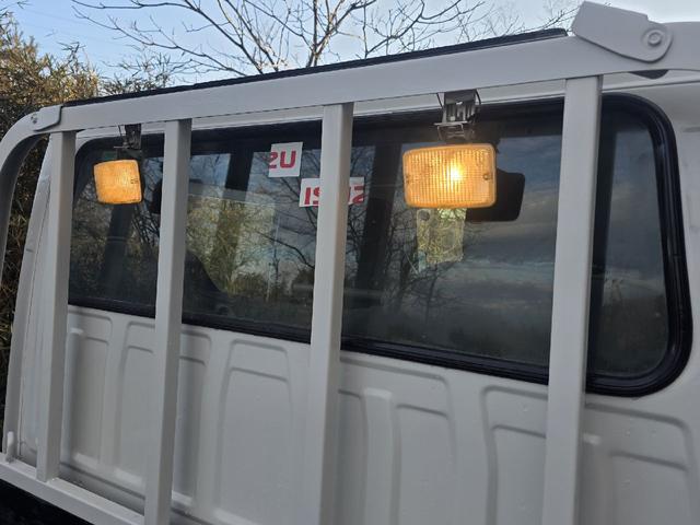 エルフトラック 　Ｗキャブ　トラック　４ＷＤ　垂直ゲート　最大積載量１４５０ｋｇ　５速マニュアル　６人乗り　キーレスエントリー　エアコン　パワーウィンドウ　運転席エアバッグ（33枚目）