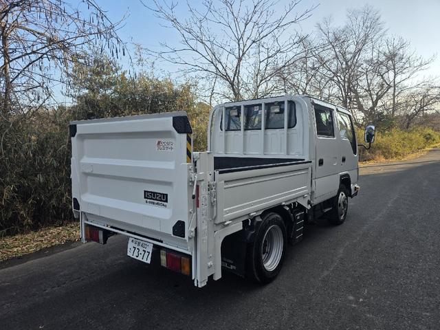 エルフトラック 　Ｗキャブ　トラック　４ＷＤ　垂直ゲート　最大積載量１４５０ｋｇ　５速マニュアル　６人乗り　キーレスエントリー　エアコン　パワーウィンドウ　運転席エアバッグ（57枚目）