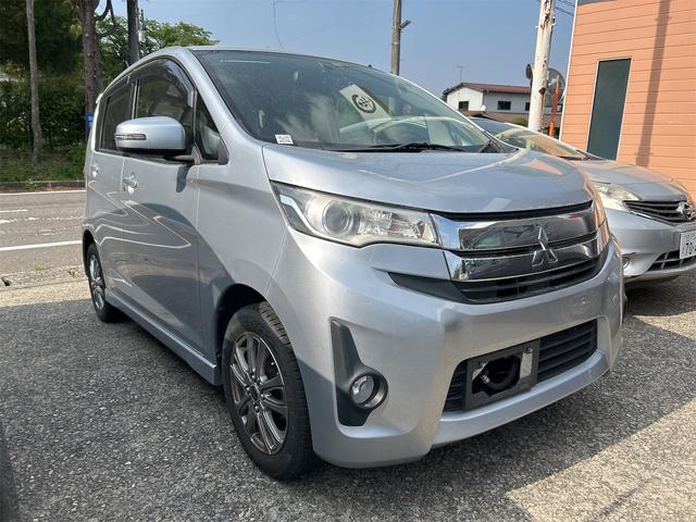 ｅＫカスタム Ｇ　バックカメラ　ＨＩＤ　スマートキー　アイドリングストップ　電動格納ミラー　ベンチシート　ＣＶＴ　盗難防止システム　ＡＢＳ　ミュージックプレイヤー接続可　アルミホイール　衝突安全ボディ　エアコン（18枚目）