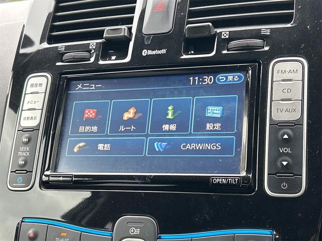 リーフ Ｘ　バックカメラ　ナビ　オートクルーズコントロール　スマートキー　電動格納ミラー　シートヒーター　ＣＶＴ　盗難防止システム　衝突安全ボディ　ＡＢＳ　ＥＳＣ　ＣＤ　ミュージックプレイヤー接続可　エアコン（5枚目）