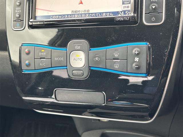 リーフ Ｘ　バックカメラ　ナビ　オートクルーズコントロール　スマートキー　電動格納ミラー　シートヒーター　ＣＶＴ　盗難防止システム　衝突安全ボディ　ＡＢＳ　ＥＳＣ　ＣＤ　ミュージックプレイヤー接続可　エアコン（6枚目）