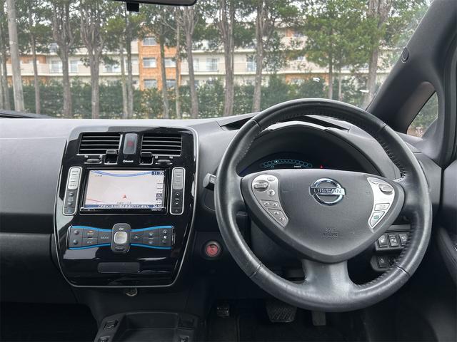 リーフ Ｘ　バックカメラ　ナビ　オートクルーズコントロール　スマートキー　電動格納ミラー　シートヒーター　ＣＶＴ　盗難防止システム　衝突安全ボディ　ＡＢＳ　ＥＳＣ　ＣＤ　ミュージックプレイヤー接続可　エアコン（52枚目）