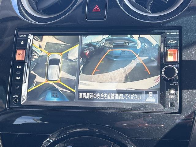ノート メダリスト　全周囲カメラ　ナビ　オートライト　スマートキー　アイドリングストップ　電動格納ミラー　ＣＶＴ　盗難防止システム　衝突安全ボディ　ＡＢＳ　ミュージックプレイヤー接続可　エアコン　パワーステアリング（4枚目）
