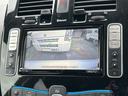 リーフ Ｘ　バックカメラ　ナビ　オートクルーズコントロール　スマートキー　電動格納ミラー　シートヒーター　ＣＶＴ　盗難防止システム　衝突安全ボディ　ＡＢＳ　ＥＳＣ　ＣＤ　ミュージックプレイヤー接続可　エアコン（4枚目）