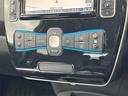 リーフ Ｘ　バックカメラ　ナビ　オートクルーズコントロール　スマートキー　電動格納ミラー　シートヒーター　ＣＶＴ　盗難防止システム　衝突安全ボディ　ＡＢＳ　ＥＳＣ　ＣＤ　ミュージックプレイヤー接続可　エアコン（6枚目）