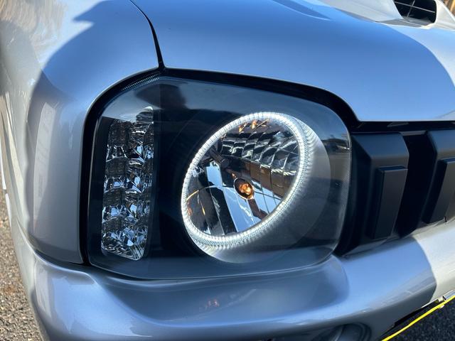 ジムニー ＸＧ　リフトアップ！社外マフラー！イカリングヘッドライト！社外スモークファイバーテール！実走行！シートカバー！デジタルインナーミラー！内外装クリーニング済み！（12枚目）