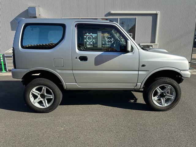 ジムニー ＸＧ　リフトアップ！社外マフラー！イカリングヘッドライト！社外スモークファイバーテール！実走行！シートカバー！デジタルインナーミラー！内外装クリーニング済み！（18枚目）