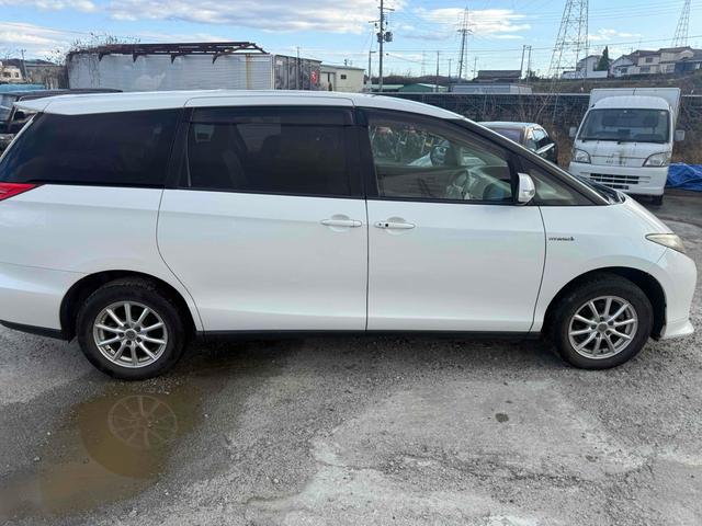 エスティマハイブリッド G 4WD ETC ナビ オートクルーズコントロール パークアシスト 両側電動スライドドア オートライト HID サンルーフ スマートキー 電動格納ミラー 後席モニター 3列シート パワーシート CVT(15枚目)