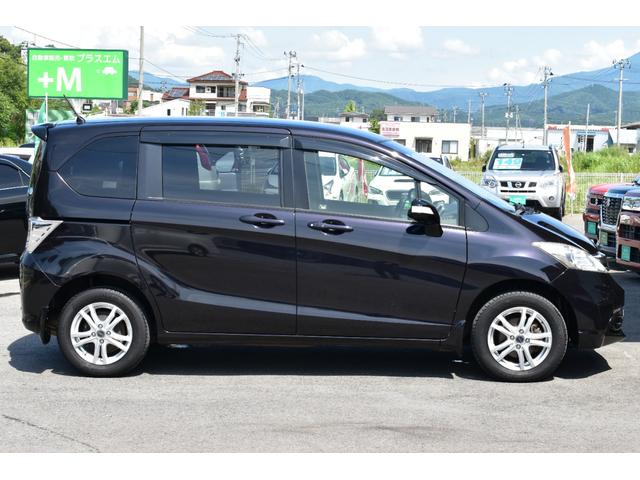 フリード Ｇ　ジャストセレクション　４ＷＤ・両側パワースライドドア・社外ナビ・フルセグＴＶ・バックカメラ・ＣＤ録音・ＤＶＤ再生・Ｂｌｕｅｔｏｏｔｈ・ＥＴＣ・クルーズコントロール・ＨＩＤオートライト・フォグ・スマートキー・１５インチアルミ（10枚目）