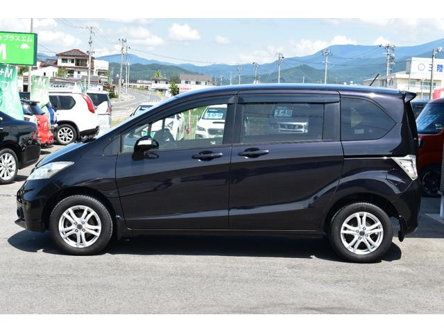 フリード Ｇ　ジャストセレクション　４ＷＤ・両側パワースライドドア・社外ナビ・フルセグＴＶ・バックカメラ・ＣＤ録音・ＤＶＤ再生・Ｂｌｕｅｔｏｏｔｈ・ＥＴＣ・クルーズコントロール・ＨＩＤオートライト・フォグ・スマートキー・１５インチアルミ（11枚目）