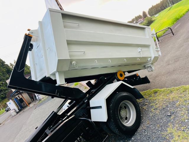 エルフトラック 　アームロール　新明和　最大積載量２０００ｋｇ　荷台付き　リア観音開き　５速マニュアル　ＥＴＣ　エアコン　パワステ　パワーウィンドウ（12枚目）