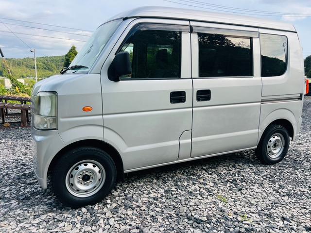 スクラム ＰＣ　４ＷＤ　オートマ　ターボ　ナビ　エアコン　パワステ　パワーウィンドウ　ナビ　両側スライドドア　運転席助手席エアバック　ドアバイザー（6枚目）