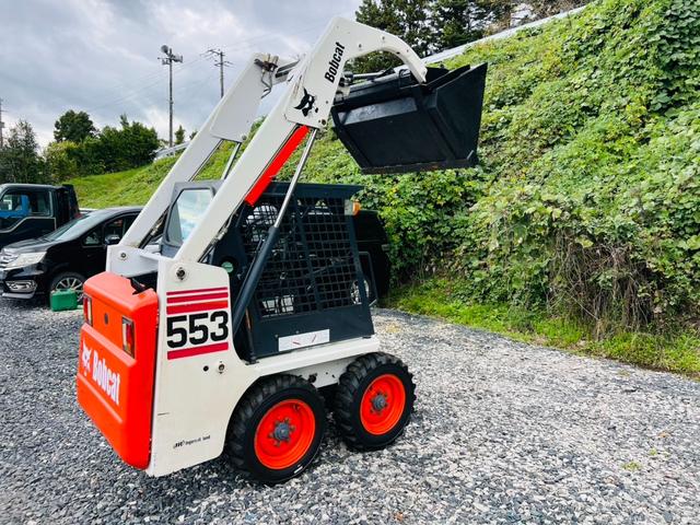 アメリカその他 bobcat 553 4WD スキッドステアローダー アワーメーター713h 新品タイヤ ディーゼル車(3枚目)