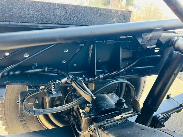 エルフトラック ダンプ 4WD 5速マニュアル 最大積載量2000kg コボレーン HSAヒルスタートアシスト アイドリングストップ 後輪ダブルタイヤ エアコン パワステ パワーウィンドウ エアバック(34枚目)