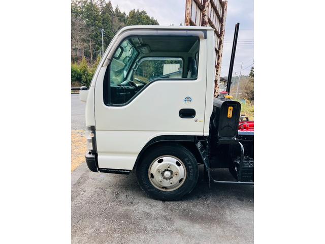 エルフトラック アームロール 5速マニュアル 最大積載量3000kg HSAヒルスタートアシスト エアコンパワステ パワーウィンドウ ETC(7枚目)