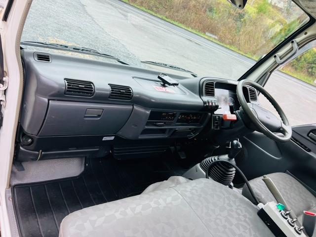 エルフトラック アームロール 5速マニュアル 最大積載量3000kg HSAヒルスタートアシスト エアコンパワステ パワーウィンドウ ETC(45枚目)