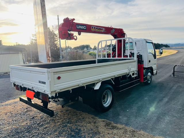 エルフトラック ロング 平ボディー ロングワイド 4WD 最大積載量2000kg ユニッククレーン ラジコン付き アウトリガー 5速マニュアル エンジン4HG1 エアコン パワステ パワーウィンドウ 坂道発進補助装置付き(9枚目)