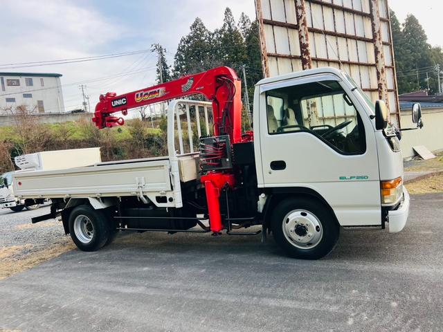 エルフトラック ロング 平ボディー ロングワイド 4WD 最大積載量2000kg ユニッククレーン ラジコン付き アウトリガー 5速マニュアル エンジン4HG1 エアコン パワステ パワーウィンドウ 坂道発進補助装置付き(12枚目)