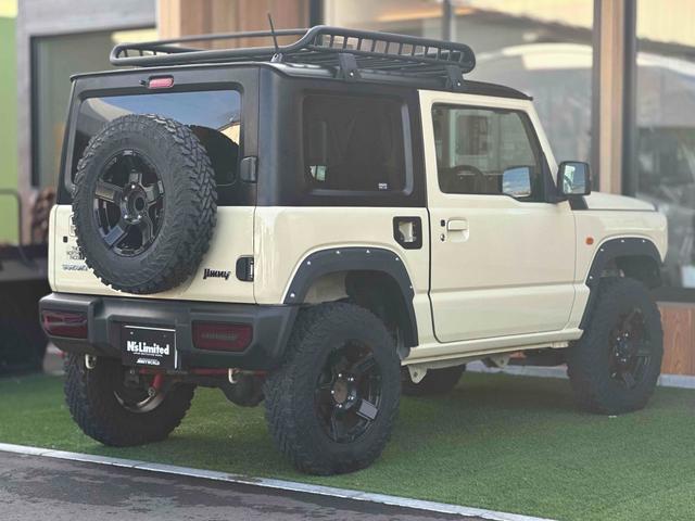 ジムニー XL 4WD TOCバンパー 2インチリフトアップ サンダーテール ショウワガレージキャリア BRAT製アルミホイール YOKOHAMA GEOLANDER ナビ TV スマートキー 電動格納ミラー(21枚目)