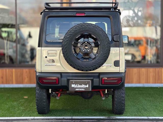 ジムニー XL 4WD TOCバンパー 2インチリフトアップ サンダーテール ショウワガレージキャリア BRAT製アルミホイール YOKOHAMA GEOLANDER ナビ TV スマートキー 電動格納ミラー(22枚目)
