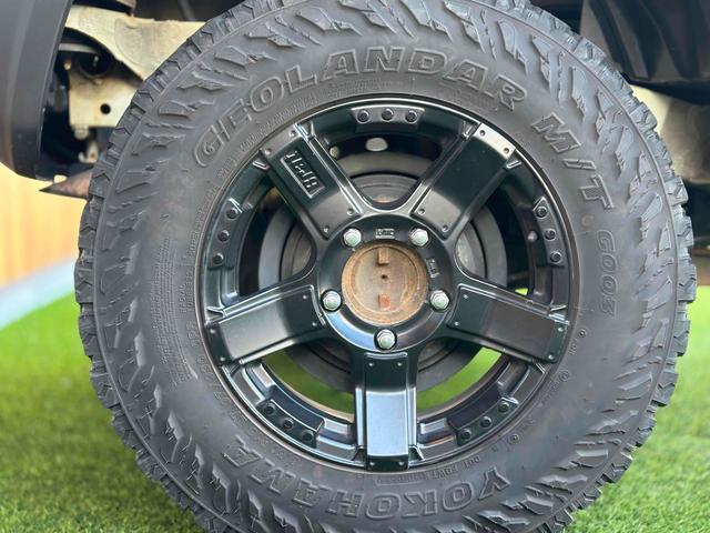 ジムニー XL 4WD TOCバンパー 2インチリフトアップ サンダーテール ショウワガレージキャリア BRAT製アルミホイール YOKOHAMA GEOLANDER ナビ TV スマートキー 電動格納ミラー(27枚目)