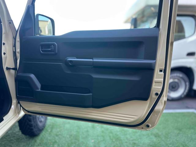 ジムニー XL 4WD TOCバンパー 2インチリフトアップ サンダーテール ショウワガレージキャリア BRAT製アルミホイール YOKOHAMA GEOLANDER ナビ TV スマートキー 電動格納ミラー(40枚目)