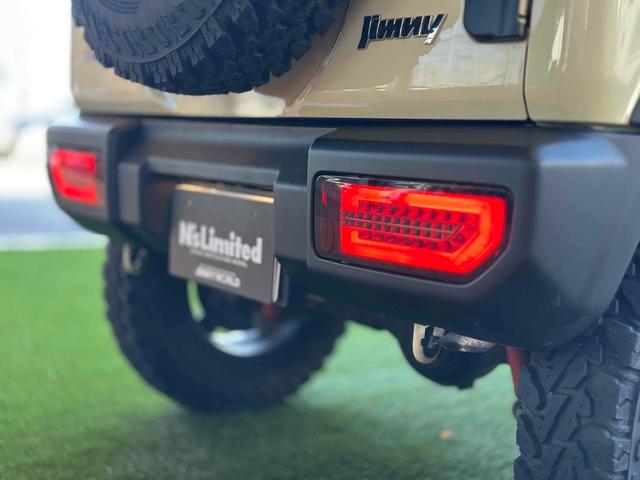 ジムニー XL 4WD TOCバンパー 2インチリフトアップ サンダーテール ショウワガレージキャリア BRAT製アルミホイール YOKOHAMA GEOLANDER ナビ TV スマートキー 電動格納ミラー(44枚目)