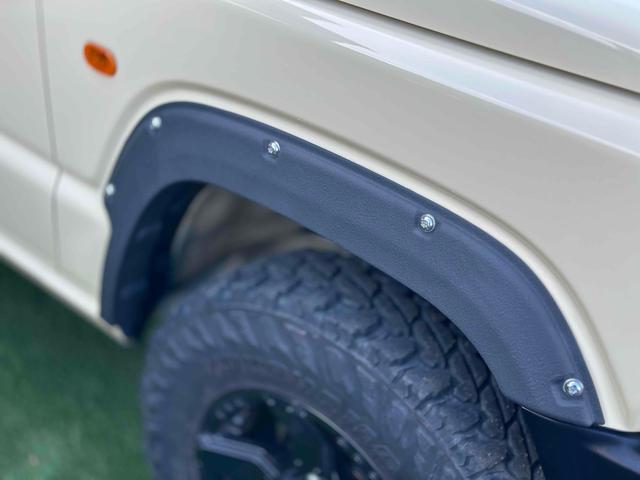 ジムニー XL 4WD TOCバンパー 2インチリフトアップ サンダーテール ショウワガレージキャリア BRAT製アルミホイール YOKOHAMA GEOLANDER ナビ TV スマートキー 電動格納ミラー(45枚目)