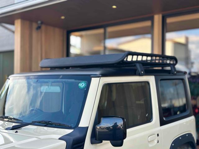 ジムニー XL 4WD TOCバンパー 2インチリフトアップ サンダーテール ショウワガレージキャリア BRAT製アルミホイール YOKOHAMA GEOLANDER ナビ TV スマートキー 電動格納ミラー(51枚目)