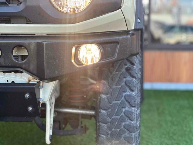 ジムニー XL 4WD TOCバンパー 2インチリフトアップ サンダーテール ショウワガレージキャリア BRAT製アルミホイール YOKOHAMA GEOLANDER ナビ TV スマートキー 電動格納ミラー(54枚目)