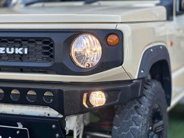 ジムニー XL 4WD TOCバンパー 2インチリフトアップ サンダーテール ショウワガレージキャリア BRAT製アルミホイール YOKOHAMA GEOLANDER ナビ TV スマートキー 電動格納ミラー(55枚目)