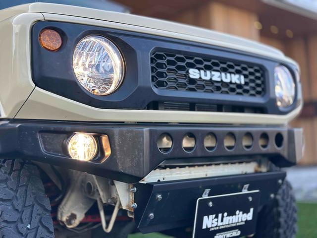 ジムニー XL 4WD TOCバンパー 2インチリフトアップ サンダーテール ショウワガレージキャリア BRAT製アルミホイール YOKOHAMA GEOLANDER ナビ TV スマートキー 電動格納ミラー(56枚目)