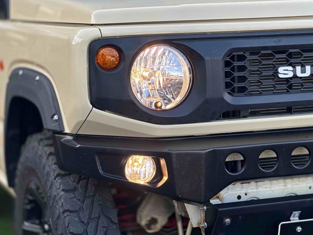 ジムニー XL 4WD TOCバンパー 2インチリフトアップ サンダーテール ショウワガレージキャリア BRAT製アルミホイール YOKOHAMA GEOLANDER ナビ TV スマートキー 電動格納ミラー(57枚目)