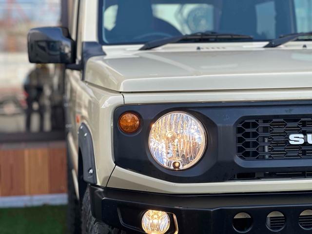 ジムニー XL 4WD TOCバンパー 2インチリフトアップ サンダーテール ショウワガレージキャリア BRAT製アルミホイール YOKOHAMA GEOLANDER ナビ TV スマートキー 電動格納ミラー(59枚目)