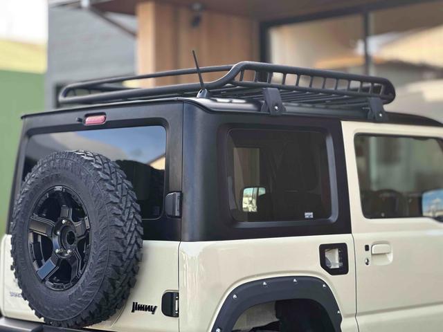 ジムニー XL 4WD TOCバンパー 2インチリフトアップ サンダーテール ショウワガレージキャリア BRAT製アルミホイール YOKOHAMA GEOLANDER ナビ TV スマートキー 電動格納ミラー(60枚目)