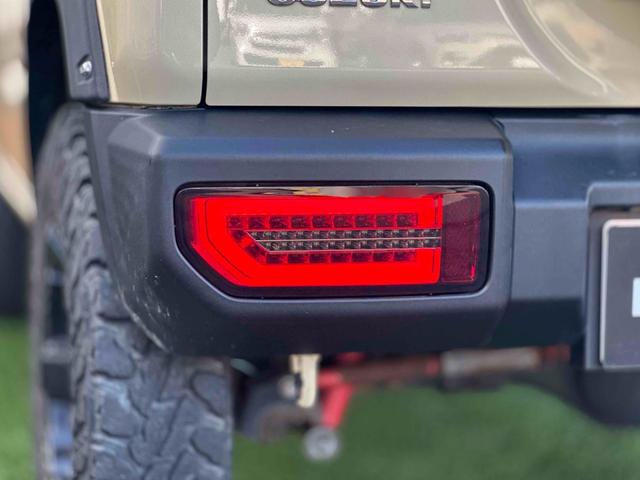 ジムニー XL 4WD TOCバンパー 2インチリフトアップ サンダーテール ショウワガレージキャリア BRAT製アルミホイール YOKOHAMA GEOLANDER ナビ TV スマートキー 電動格納ミラー(62枚目)