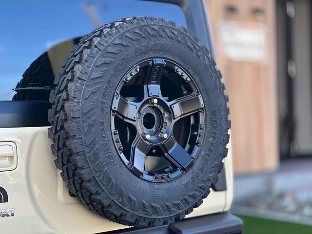 ジムニー XL 4WD TOCバンパー 2インチリフトアップ サンダーテール ショウワガレージキャリア BRAT製アルミホイール YOKOHAMA GEOLANDER ナビ TV スマートキー 電動格納ミラー(63枚目)