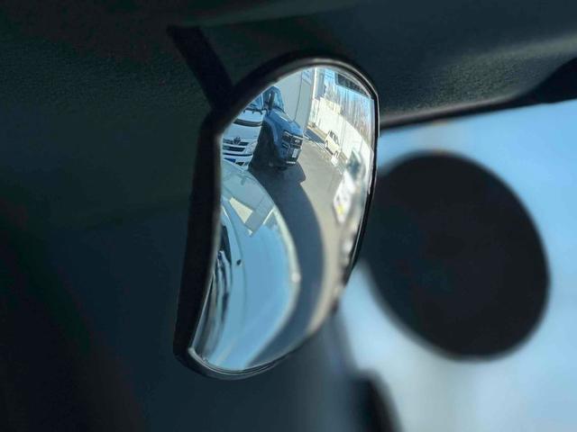 ジムニー XL 4WD TOCバンパー 2インチリフトアップ サンダーテール ショウワガレージキャリア BRAT製アルミホイール YOKOHAMA GEOLANDER ナビ TV スマートキー 電動格納ミラー(65枚目)