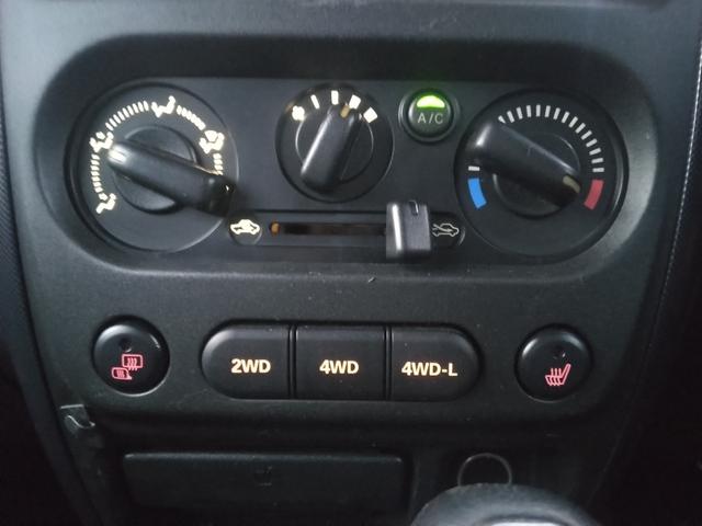 ジムニー ワイルドウインド　４ＷＤ　キーレスエントリー　電動格納ミラー　シートヒーター　ＡＴ　ＡＢＳ　ＣＤ　ルーフレール　アルミホイール　衝突安全ボディ　エアコン（6枚目）