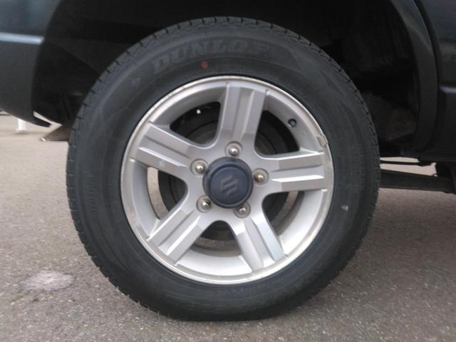 ジムニー ワイルドウインド　４ＷＤ　キーレスエントリー　電動格納ミラー　シートヒーター　ＡＴ　ＡＢＳ　ＣＤ　ルーフレール　アルミホイール　衝突安全ボディ　エアコン（29枚目）