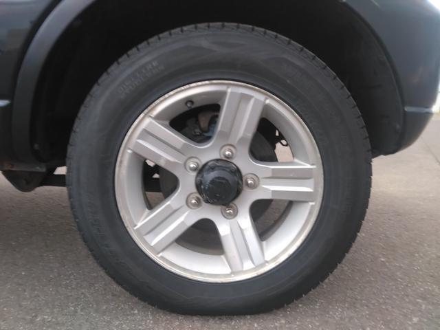 ジムニー ワイルドウインド　４ＷＤ　キーレスエントリー　電動格納ミラー　シートヒーター　ＡＴ　ＡＢＳ　ＣＤ　ルーフレール　アルミホイール　衝突安全ボディ　エアコン（32枚目）