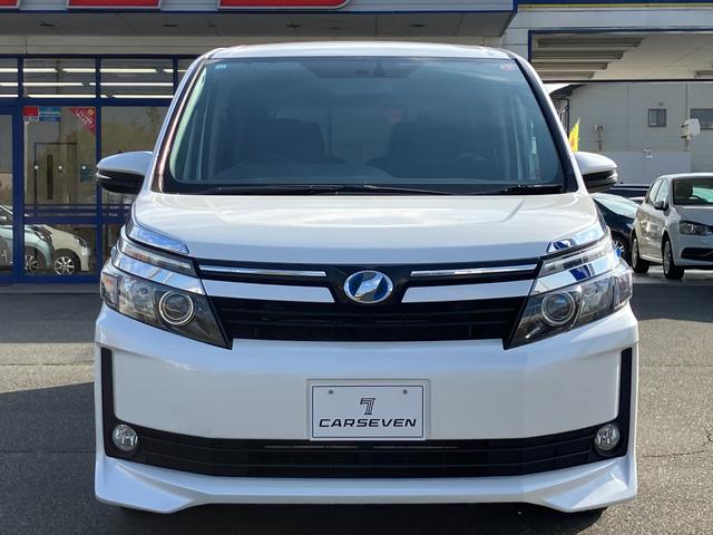 ヴォクシー ハイブリッドV 両側パワースライドドア/モデリスタエアロ/横滑防止/おくだけ充電/リアヒーター/ナビ/Bluetooth/DVD再生/バックカメラ/前席シートヒーター/ビルトインETC/オート電動格納サイドミラー(4枚目)