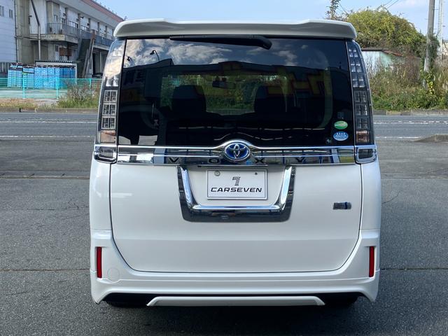 ヴォクシー ハイブリッドV 両側パワースライドドア/モデリスタエアロ/横滑防止/おくだけ充電/リアヒーター/ナビ/Bluetooth/DVD再生/バックカメラ/前席シートヒーター/ビルトインETC/オート電動格納サイドミラー(5枚目)