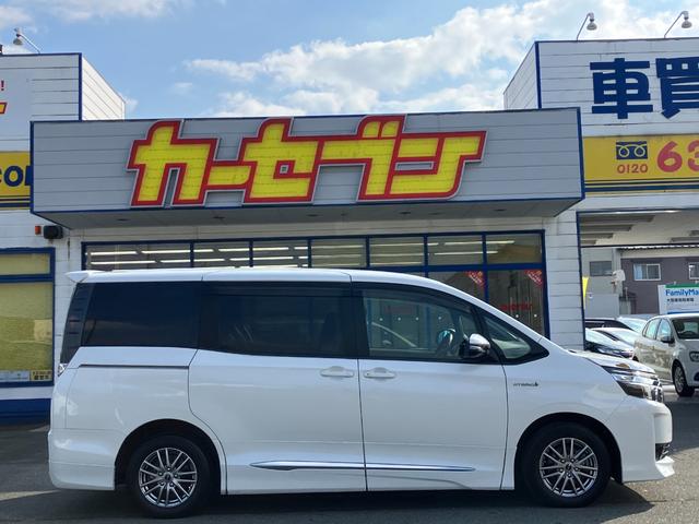 ヴォクシー ハイブリッドV 両側パワースライドドア/モデリスタエアロ/横滑防止/おくだけ充電/リアヒーター/ナビ/Bluetooth/DVD再生/バックカメラ/前席シートヒーター/ビルトインETC/オート電動格納サイドミラー(6枚目)