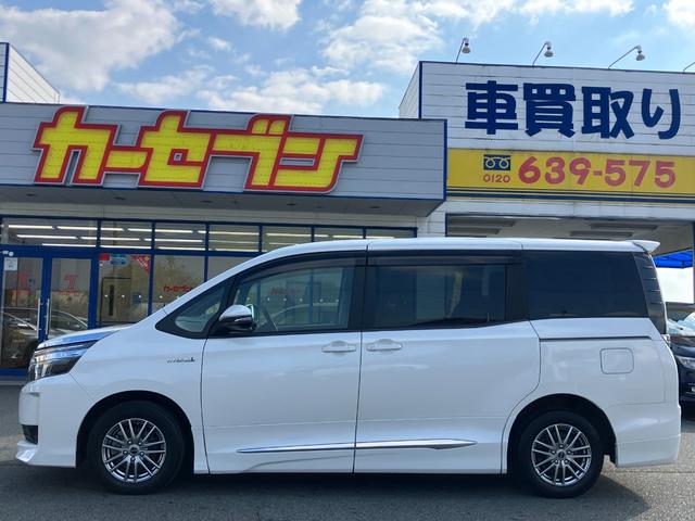 ヴォクシー ハイブリッドV 両側パワースライドドア/モデリスタエアロ/横滑防止/おくだけ充電/リアヒーター/ナビ/Bluetooth/DVD再生/バックカメラ/前席シートヒーター/ビルトインETC/オート電動格納サイドミラー(7枚目)