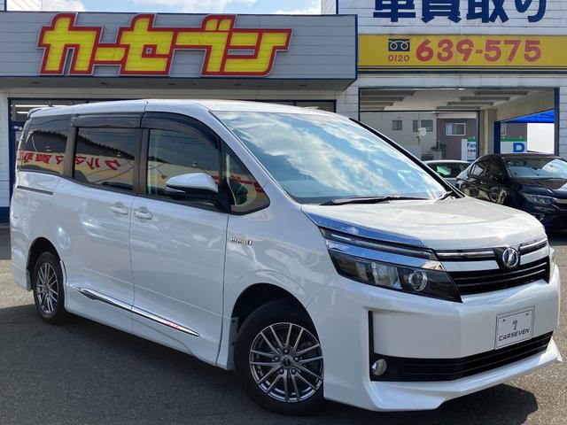 ヴォクシー ハイブリッドV 両側パワースライドドア/モデリスタエアロ/横滑防止/おくだけ充電/リアヒーター/ナビ/Bluetooth/DVD再生/バックカメラ/前席シートヒーター/ビルトインETC/オート電動格納サイドミラー(8枚目)
