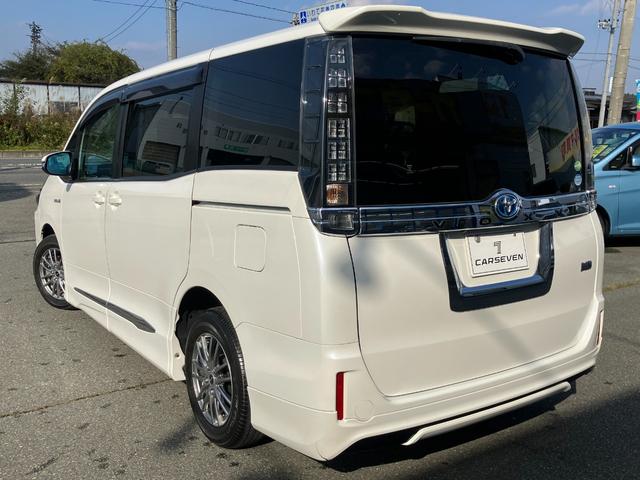 ヴォクシー ハイブリッドV 両側パワースライドドア/モデリスタエアロ/横滑防止/おくだけ充電/リアヒーター/ナビ/Bluetooth/DVD再生/バックカメラ/前席シートヒーター/ビルトインETC/オート電動格納サイドミラー(9枚目)